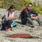 Two people enjoy a hike on Panola Mountain (Credit: David Foster).